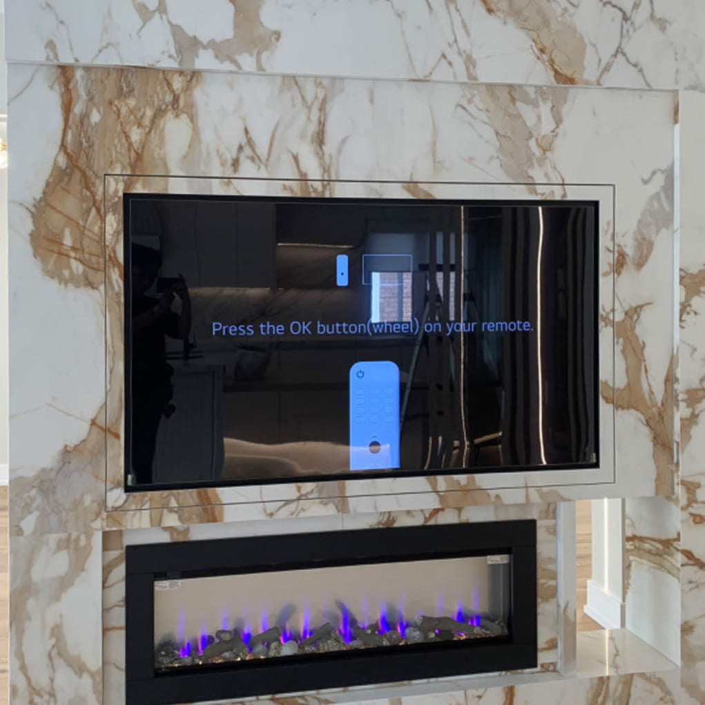 Custom Millwork-Revolving TV wall-Porcelain 2 (2) TV Wall/Fireplace