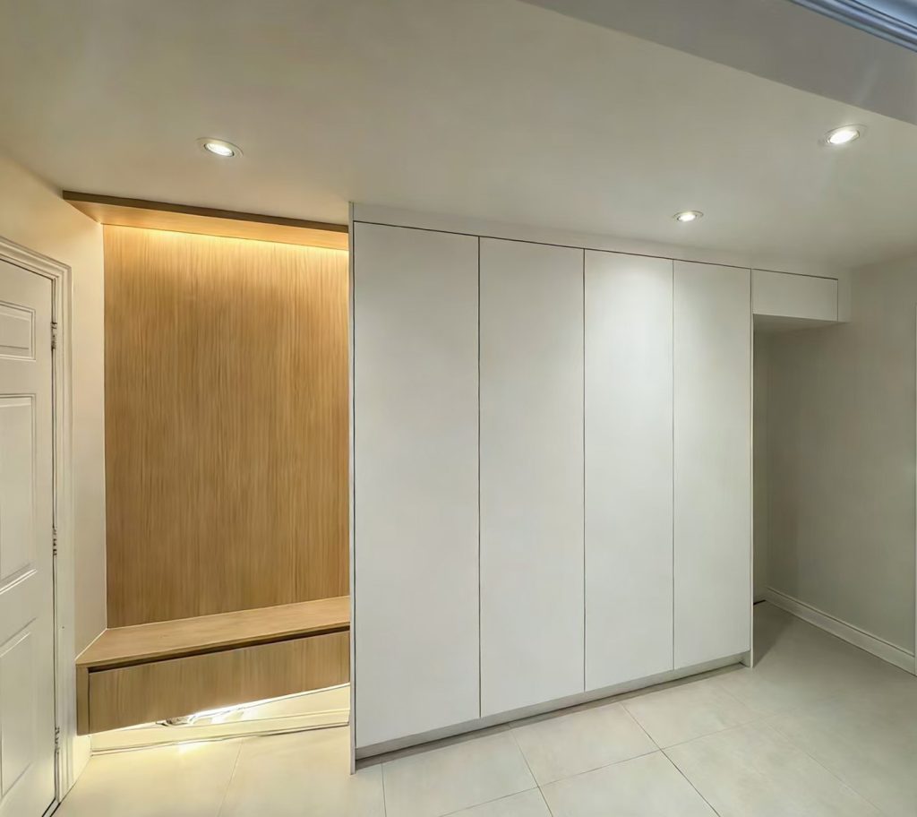 custom millwork-mudroom vs laundry-white PET vs warm wood tone